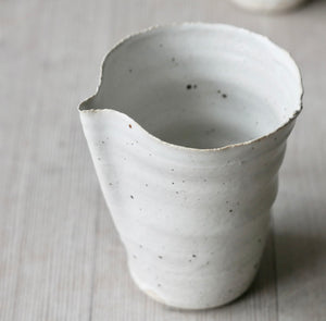 flecked jug with raw edge