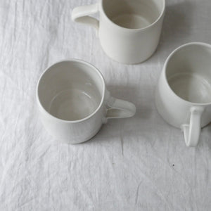 handmade simple shiny white mug