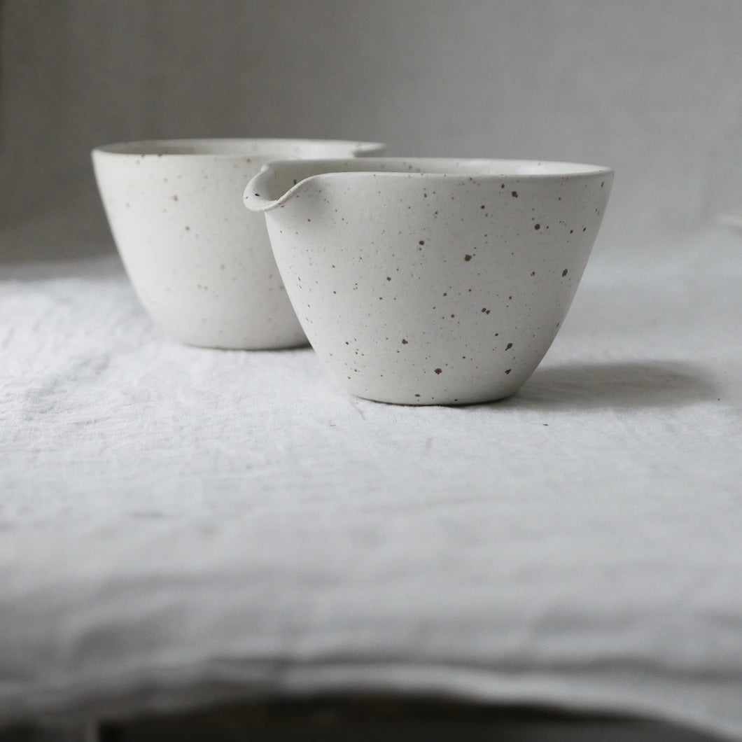 simple white small speckled pouring bowl