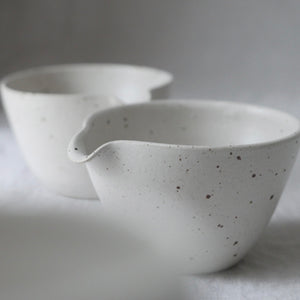 simple white small speckled pouring bowl