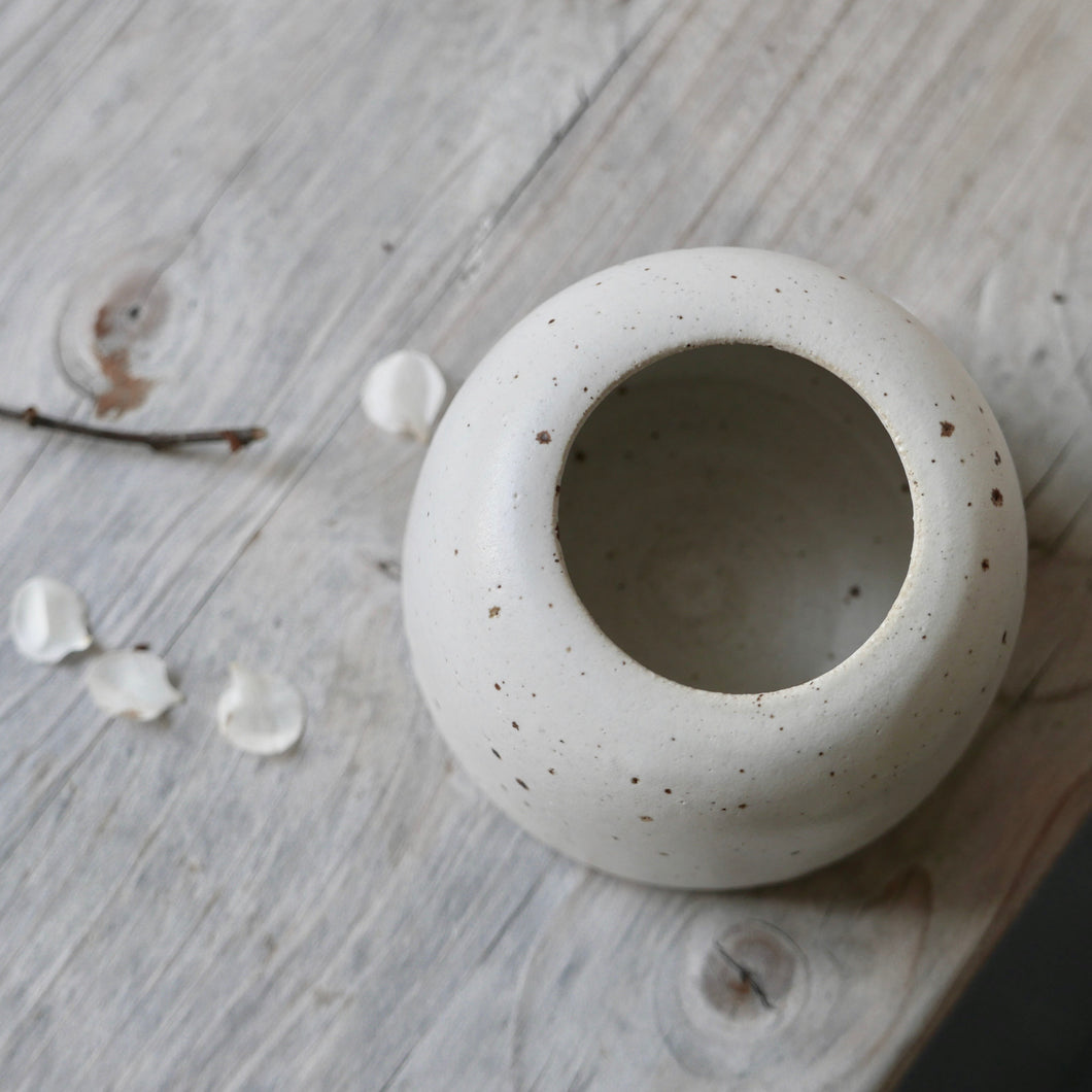 white flecked bud vase