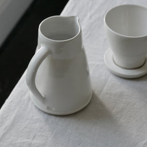 simple white stoneware coffee pot with filter & base