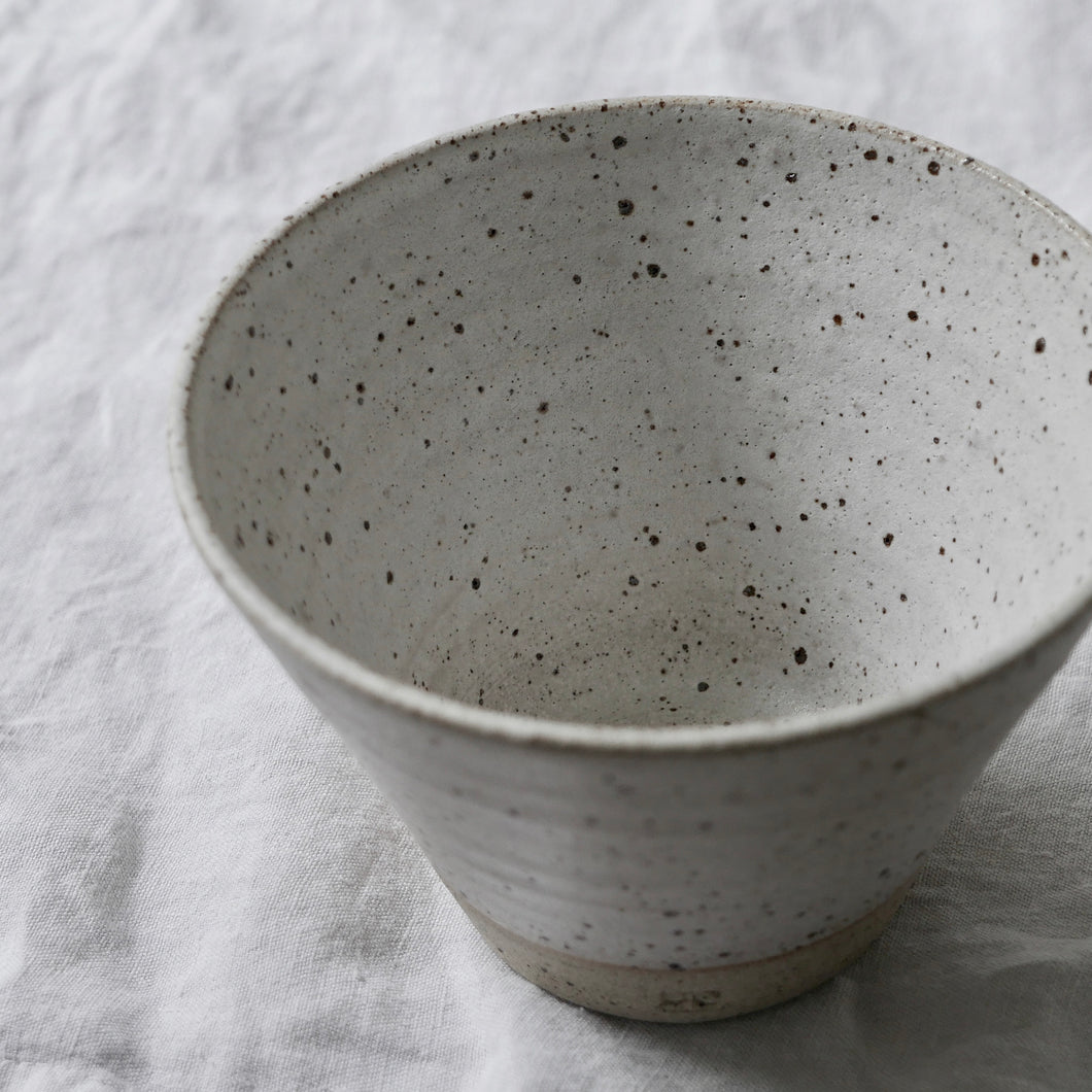 white flecked fluted small bowl in matt glaze