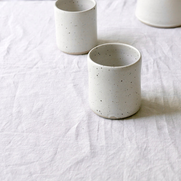 white flecked coffee tumbler