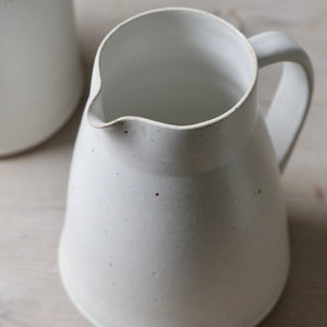 large white speckled stoneware jug